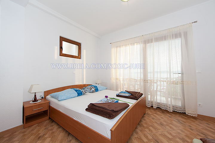 apartments Jure &Scaron;o&scaron;ić, Brela - first bedroom