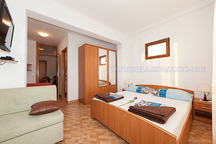 apartments Jure &Scaron;o&scaron;ić, Brela - first bedroom